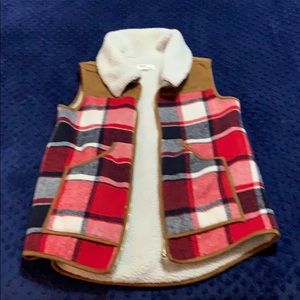 Plaid Sherpa lined vest.  Zipper in front